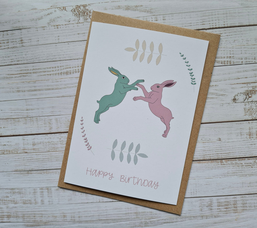 Colourful Dancing Hares Birthday Card
